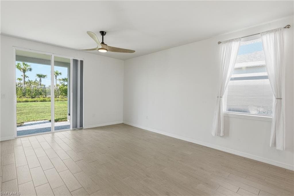 Bright interior space featuring light-toned wood-finish flooring