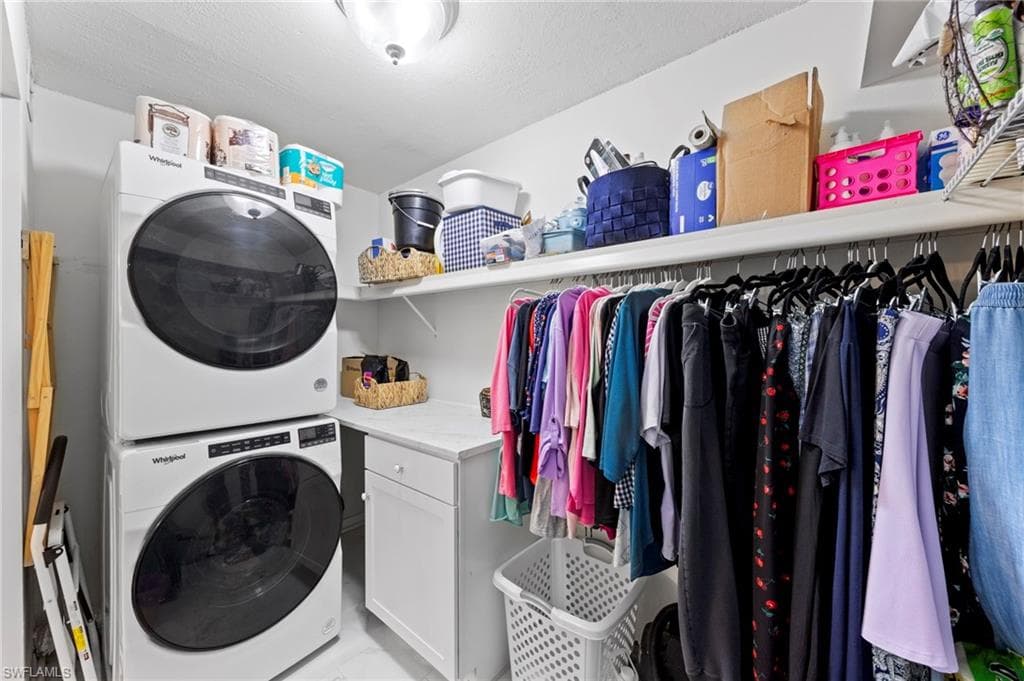 Primary closet with laundry