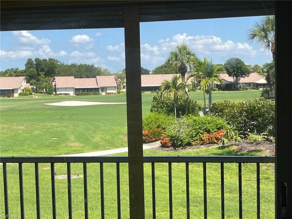 View of one of the six pools in community and the Golf Course