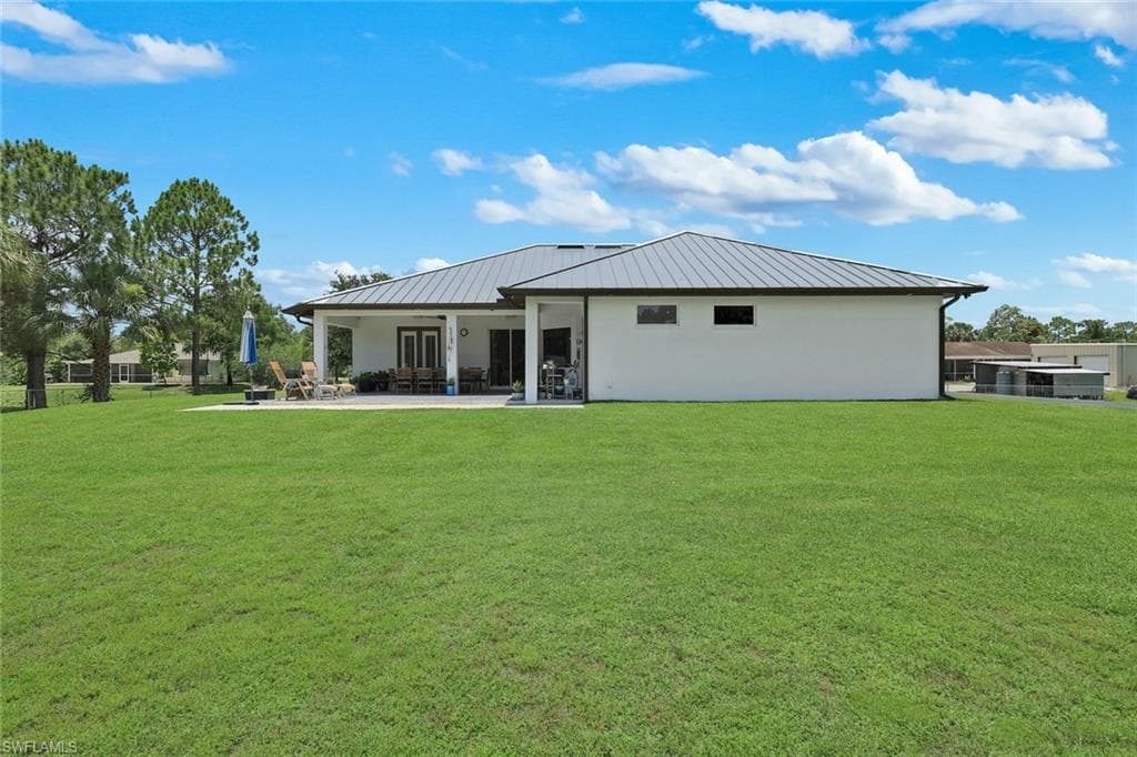 Back of Structure displaying manicured lawn