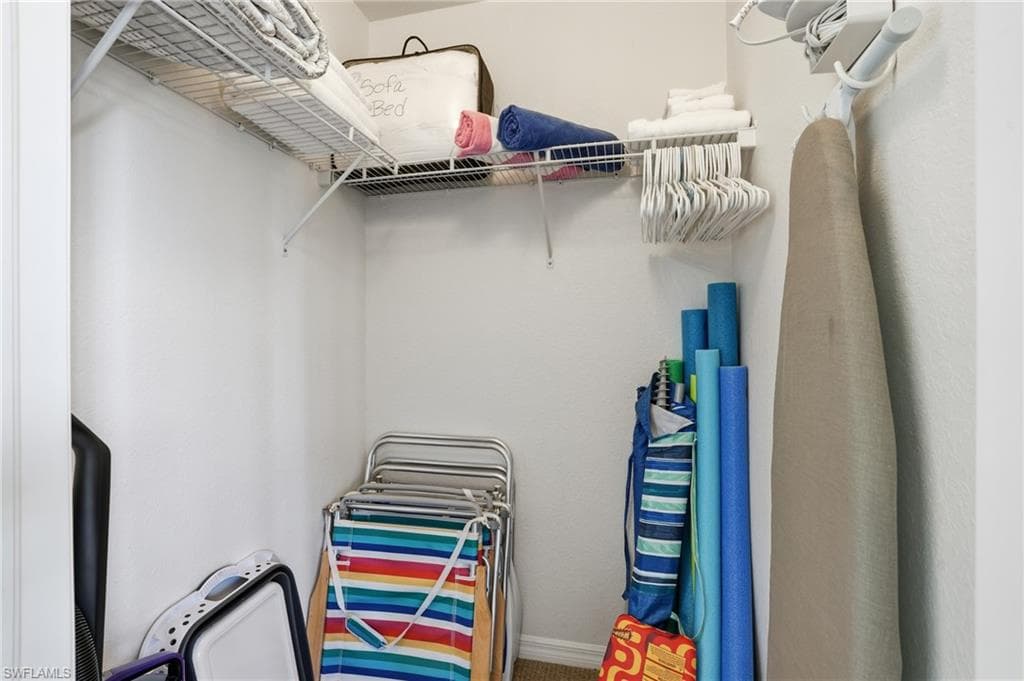 LARGE CLOSET FOR STORING BEACH AND GOLF ITEMS..