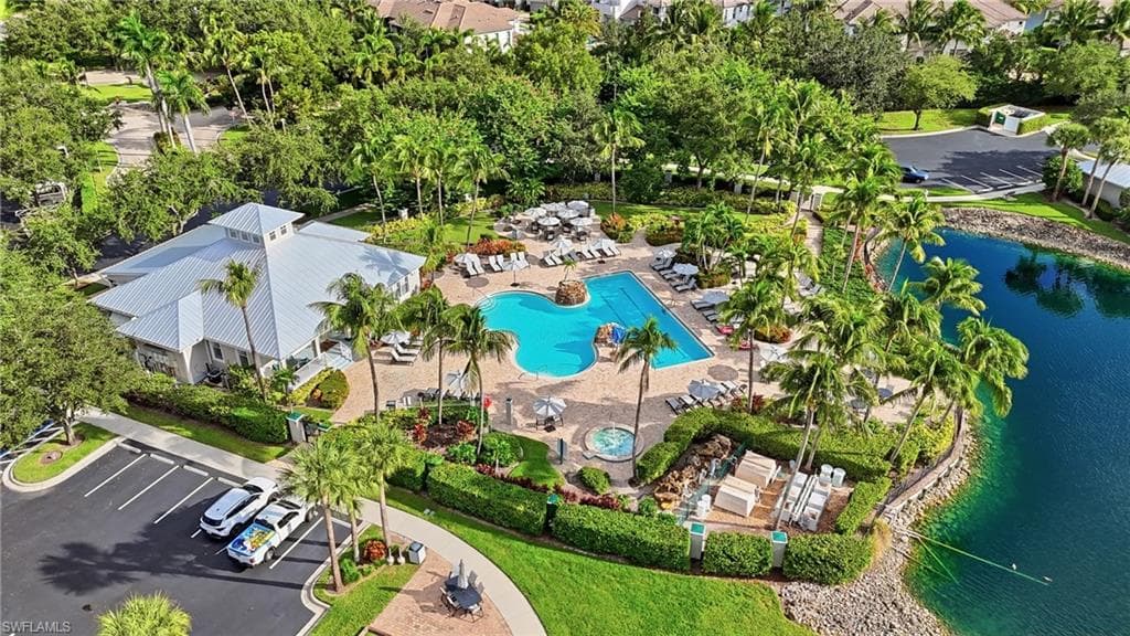 AERIAL VIEWS OF COMMUNITY POOL, SPA, AND CLUBHOUSE...