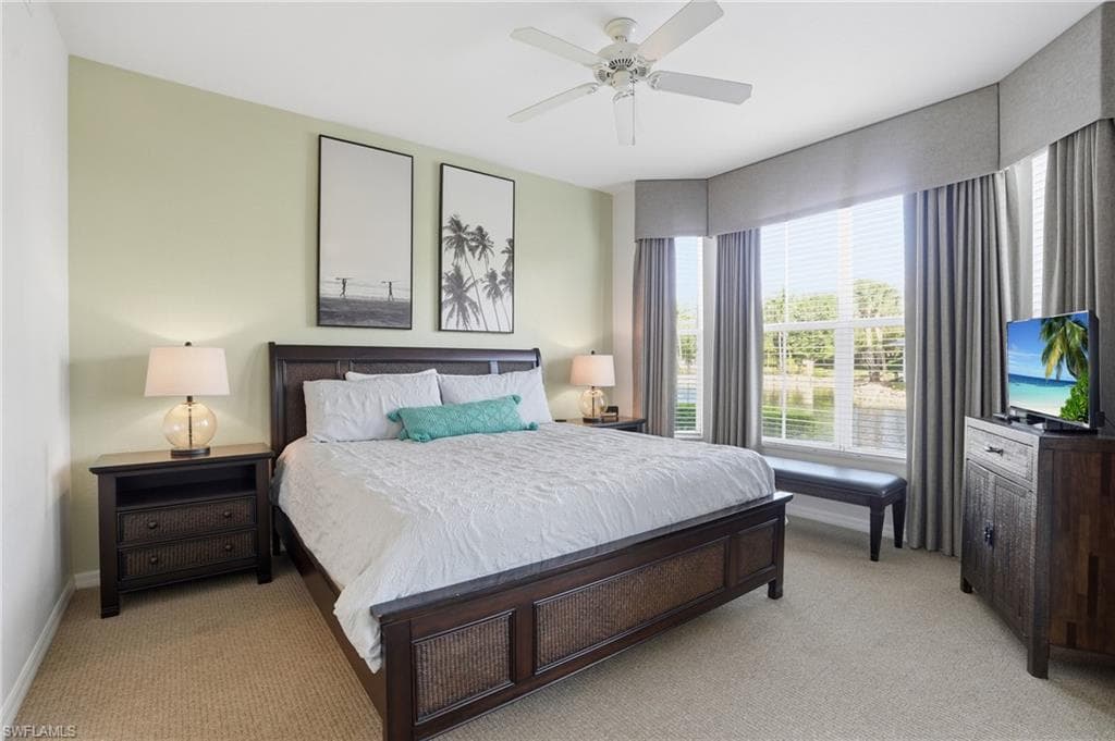 PRIMARY BEDROOM SUITE WITH WATER VIEWS FROM ALL WINDOWS!!