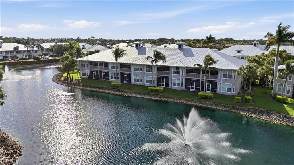 AERIAL VIEWS SHOWING STUNNING LAKE AND FOUNTAIN VIEWS FROM YOUR SCREENED LANAI..