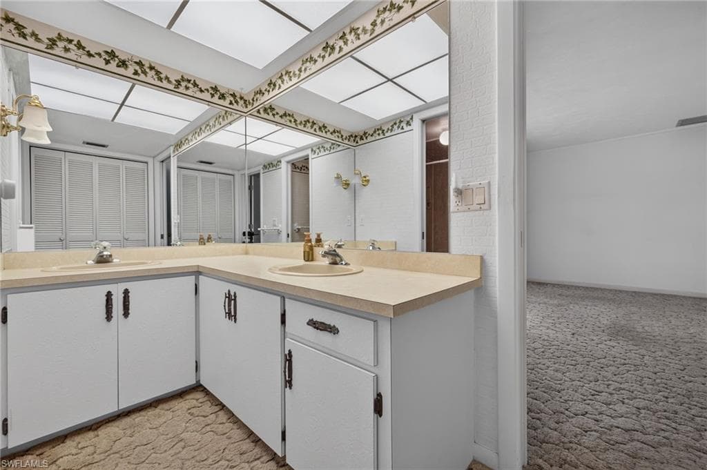 Primary, In-Suite Bathroom featuring a Double Vanity