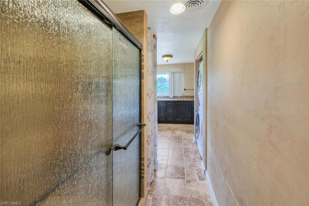 Corridor with stacked washer / dryer