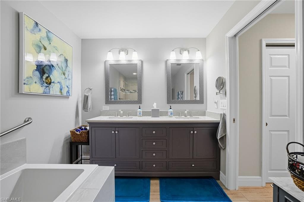 Dual vanity with undermount sinks and quartz countertops