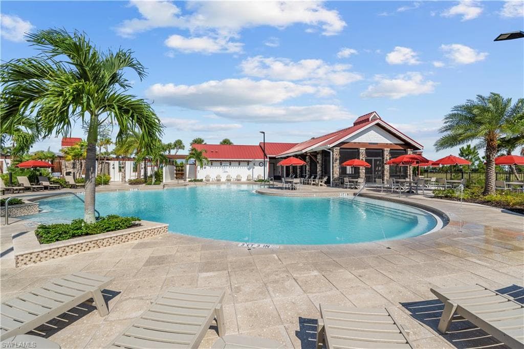 Expansive resort-style pool with integrated spa and sun deck
