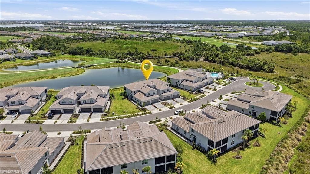 Aerial perspective showcasing a residential community with abundant green spaces