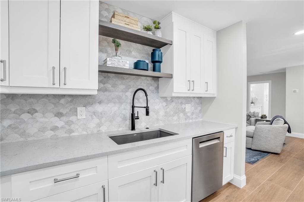 New Cabinets with Soft Close, gorgeous backsplash with a designers touch.