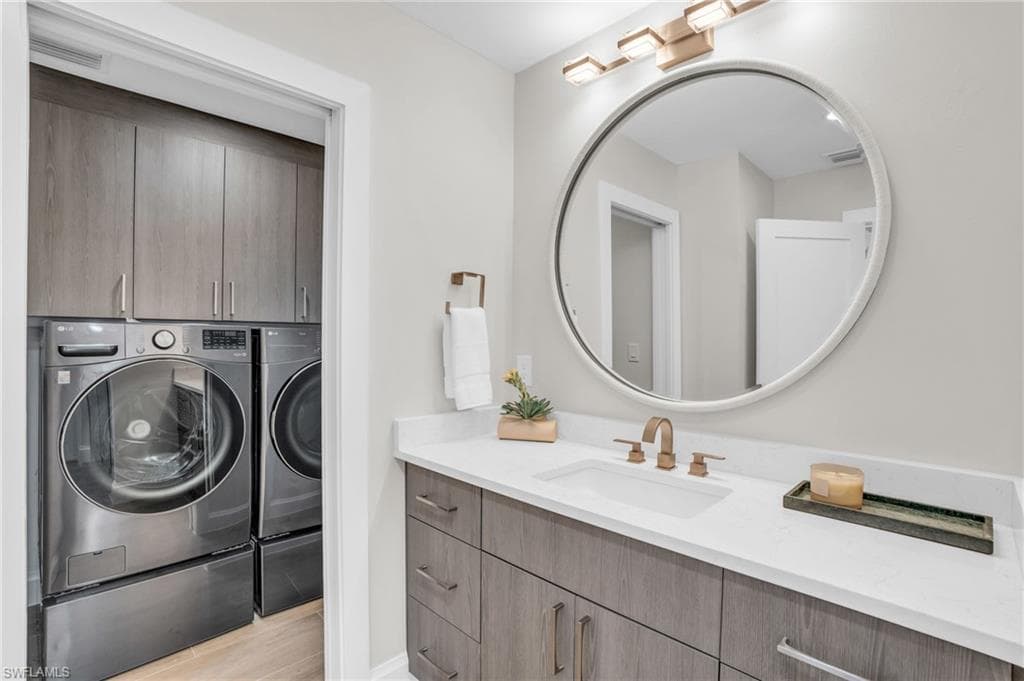 Guest Suite Bathroom and designer decorations, lighting and Washer/Dyer