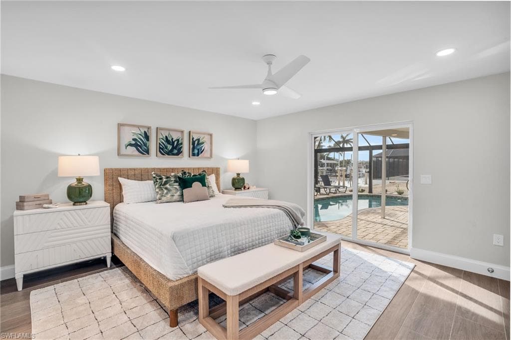 Guest Suite feels like a Primary Bedroom as well. Sliders out to the pool/lanai with so much natural light