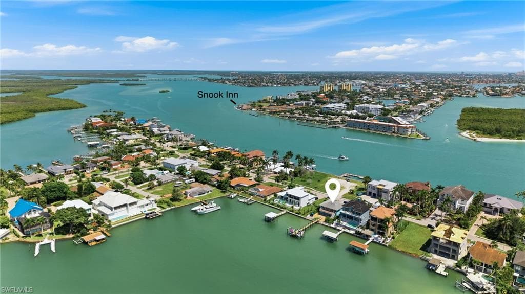 Take a quick boat ride over to Snook Inn or continue under the bridge and out to Goodland Island for some island music and food!