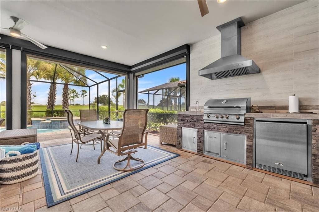 Lanai with 4' extension, outdoor kitchen and STORM SMART BLINDS