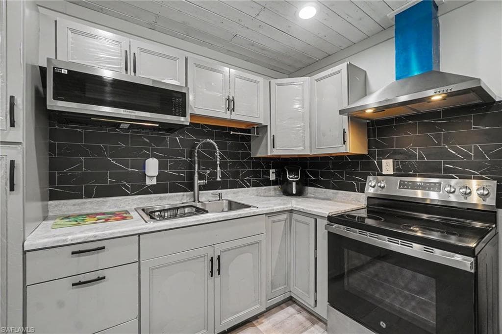 Main House - chef-inspired kitchen is outfitted with high-end stainless steel appliances, creating a sophisticated space that's as beautiful as it is practical.