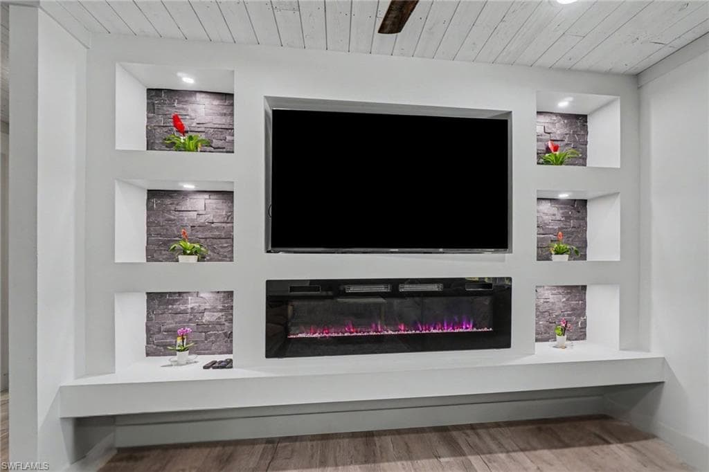 Main House - Custom Entertainment center with electric fireplace and LED lighting