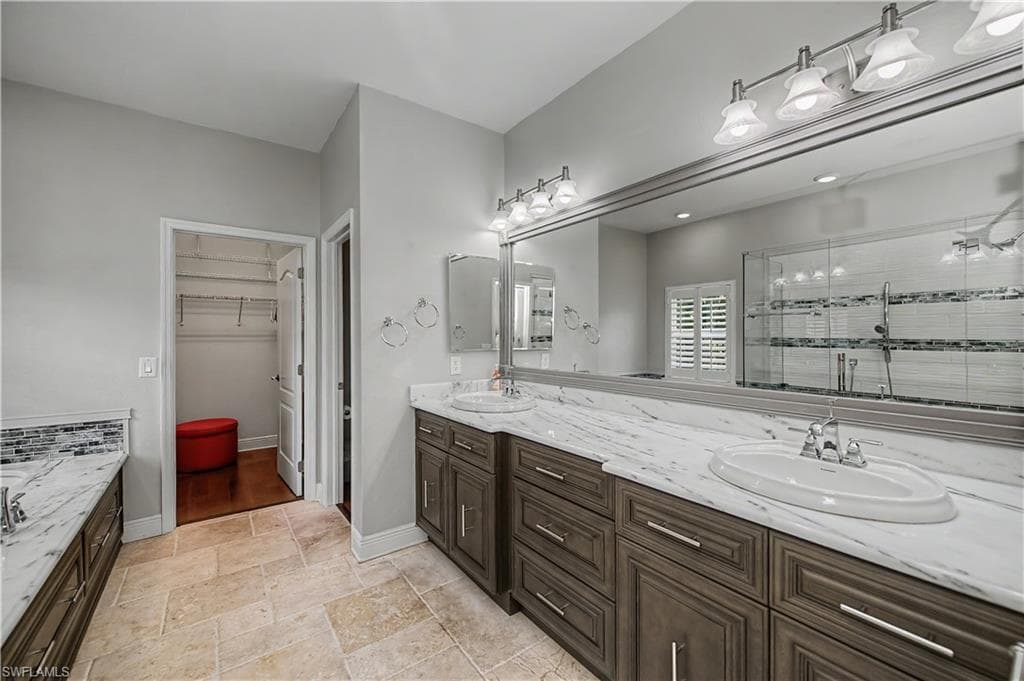 Huge Primary Bath with double lav, separate shower and tub
