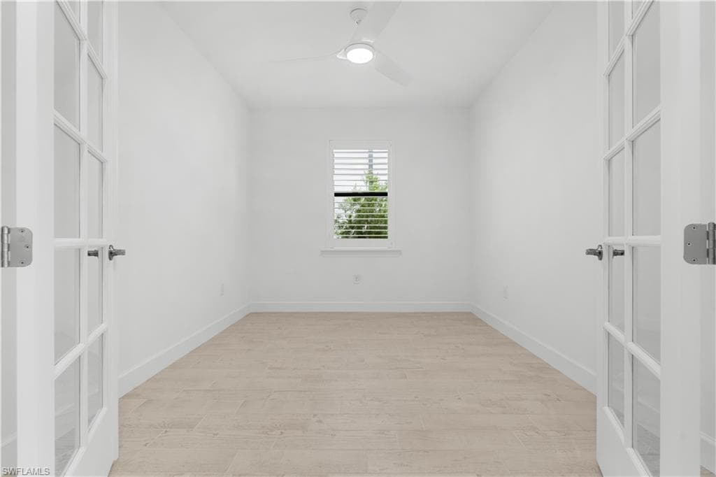 Den or personal office with french doors