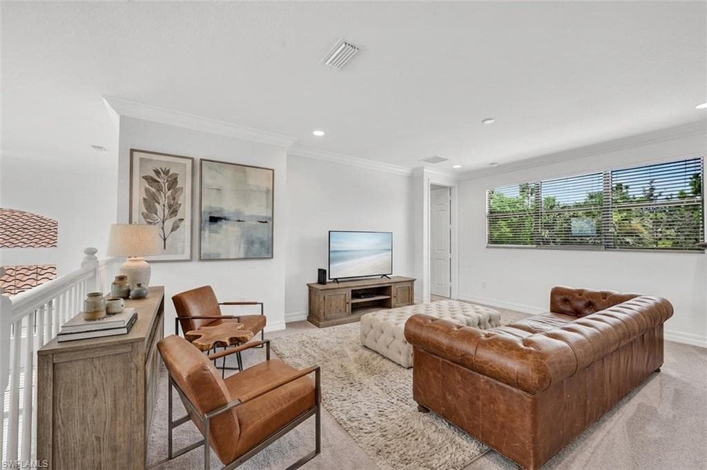 Large loft area virtually staged with new furniture and art work