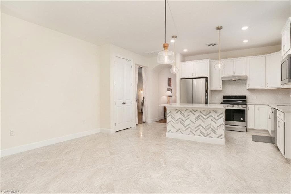 Great Room Facing Back to Kitchen