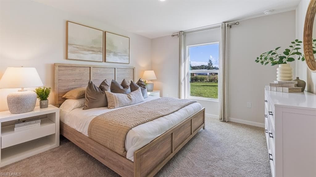 Model home. Bedroom with light carpet