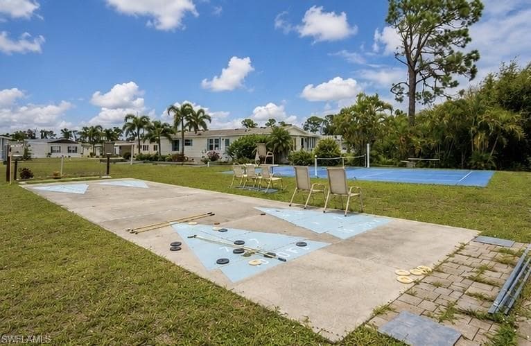 Shuffleboard court with patterned concrete surface
