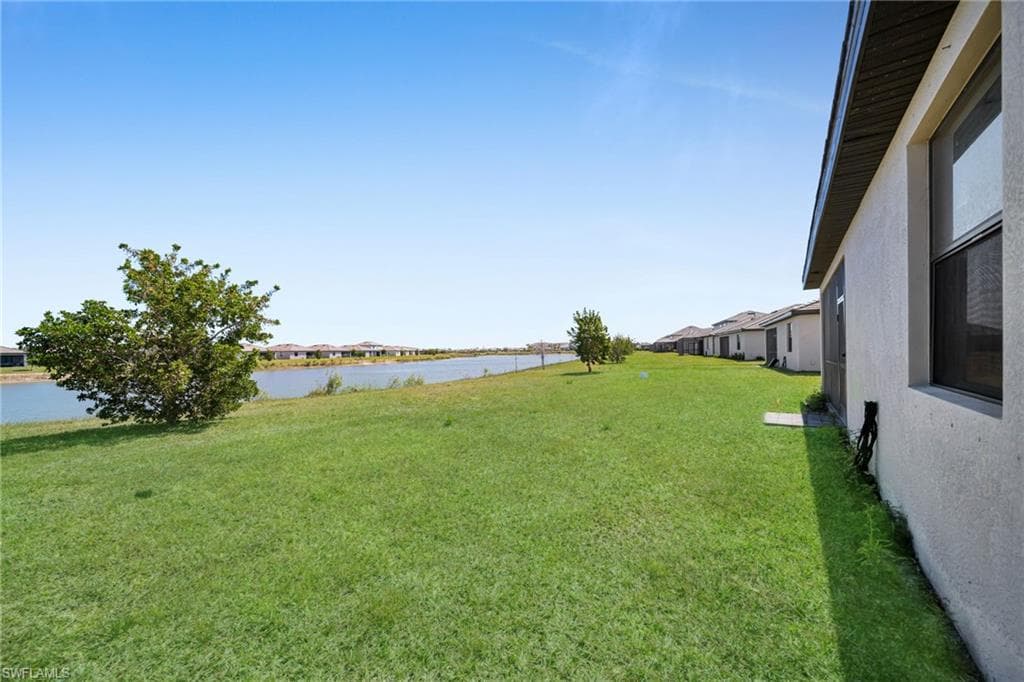 View of yard featuring a water view