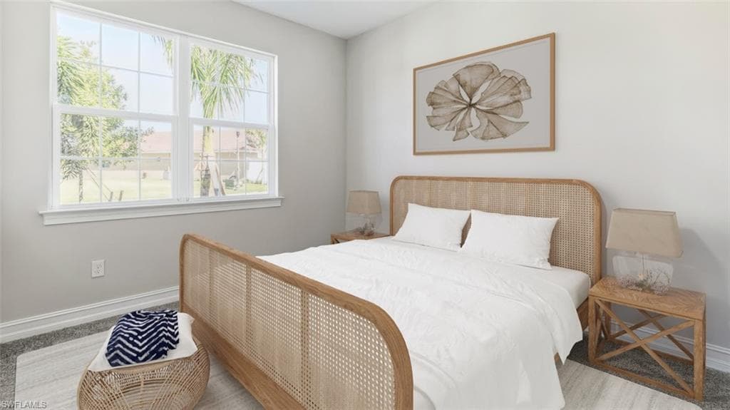 This image is virtually staged. Carpeted bedroom with baseboards