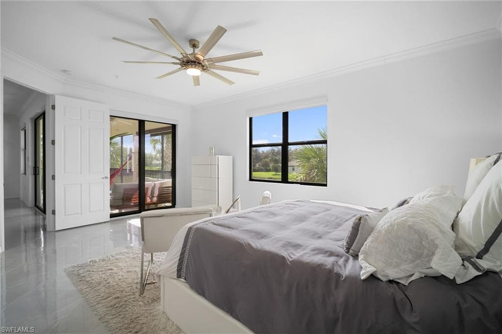 Spacious room featuring glossy tile flooring and a ceiling fan with integrated lighting