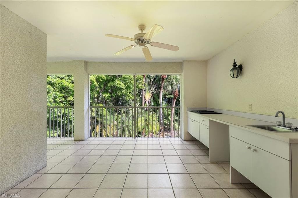 LANAI WITH A DUAL ELECTRIC GRILL AND BAR SINK