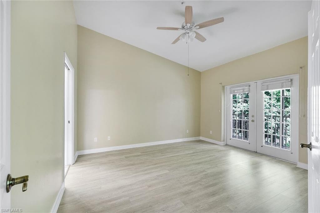 MASTER BEDROOM(BR#3) WITH FRENCH DOORS LEADING TO THE LANAI