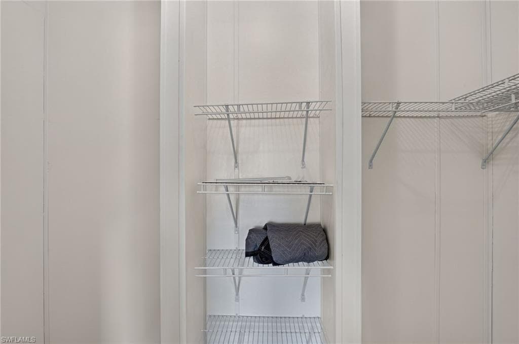 Owners Suite. Built-in wire shelving system featuring multiple tiers