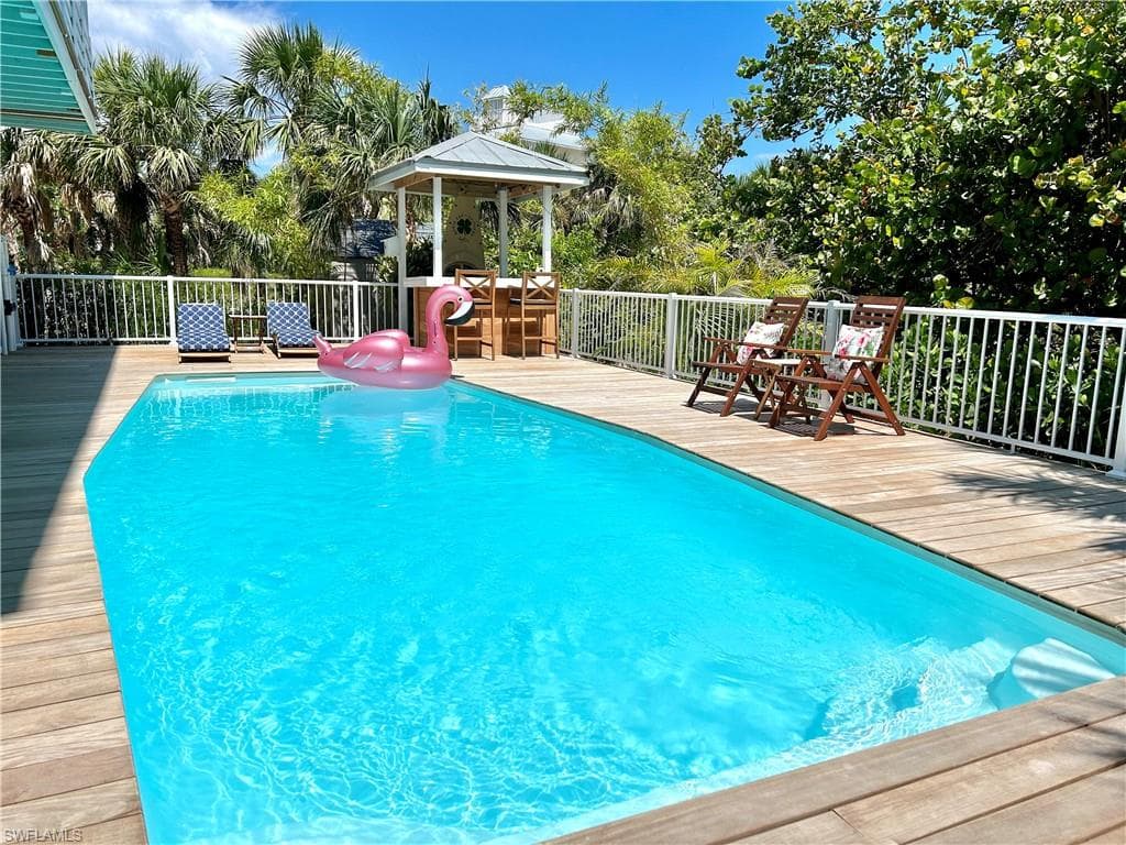 Extremely private pool surrounded by Brazilian Hardwood deck and lush tropical foliage