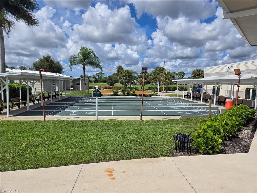 Outdoor shuffleboard courts with multiple playing surfaces