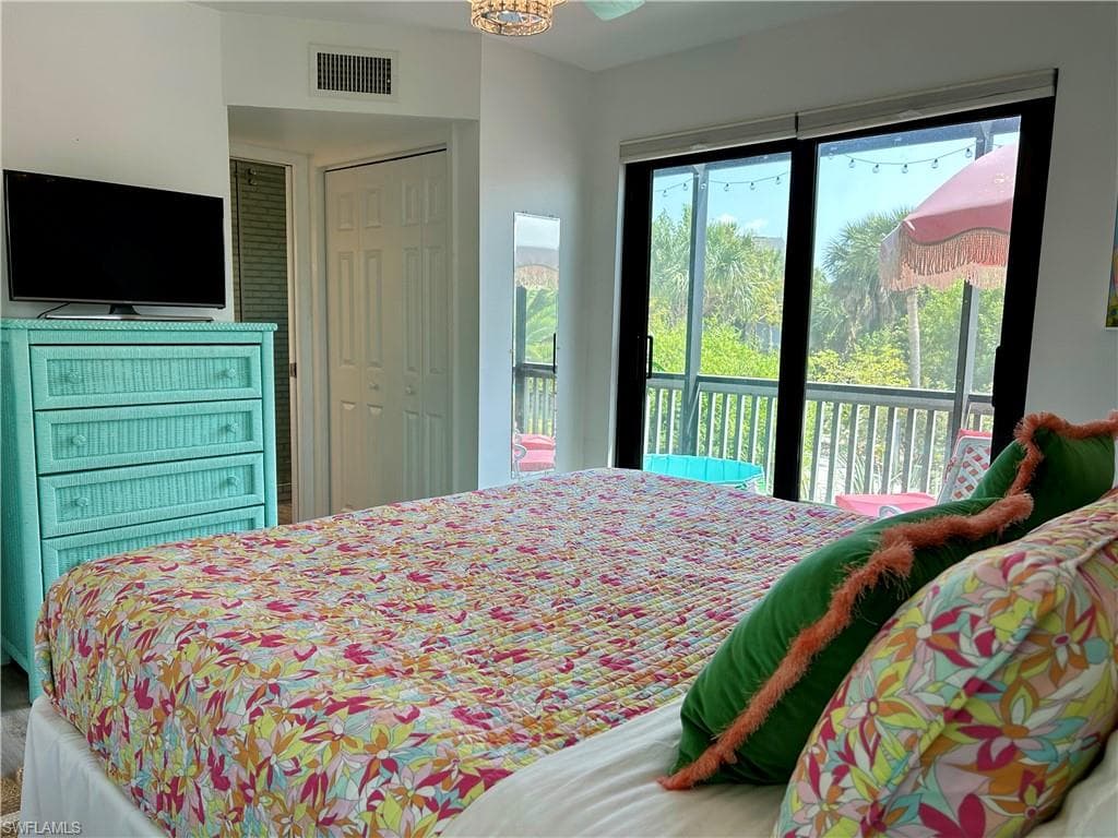 Sliding glass doors opening to an exterior balcony