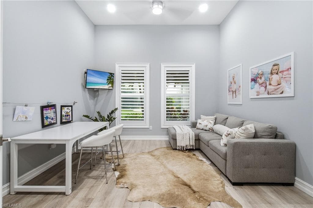 Bonus den is situated adjacent to the front foyer entry. Two glass light front doors create versatility for a fourth bedroom, exercise room, executive office, playroom or den.