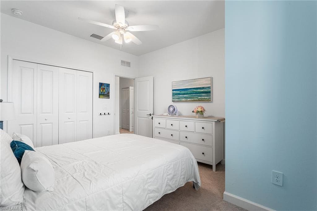 Comfortable third bedroom offering ample space, abundant natural light, and a large closet for added storage