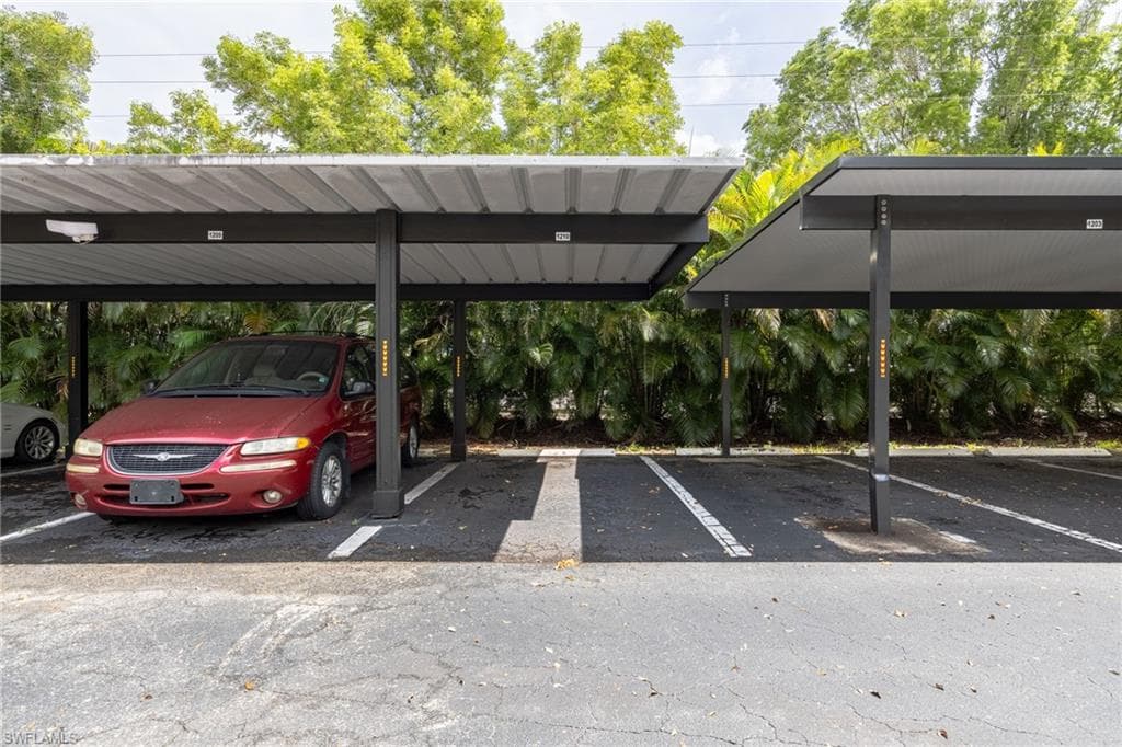 Covered parking structure with multiple spaces