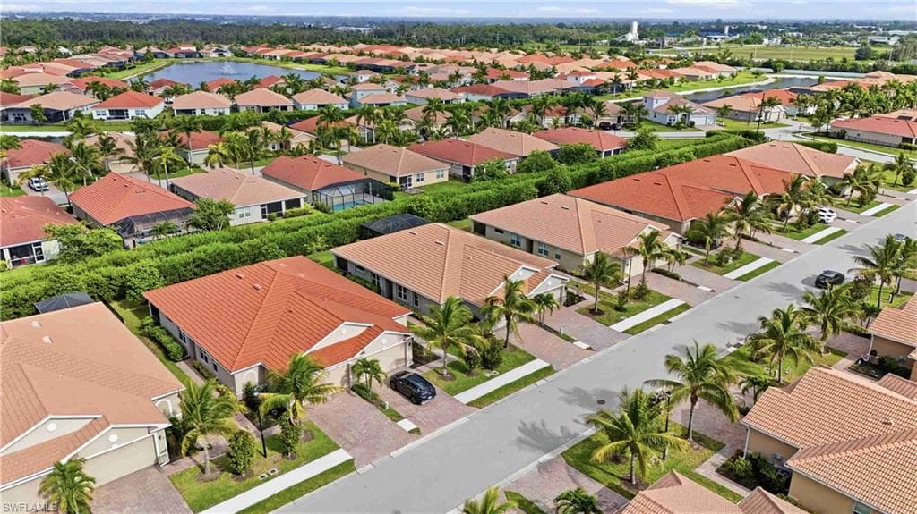 Aerial perspective showcasing residences featuring tile roofs