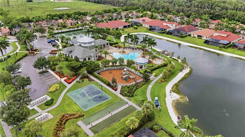 Clubhouse with swimming pool, basketball court, bocce ball courts, playground, and extensive landscaping