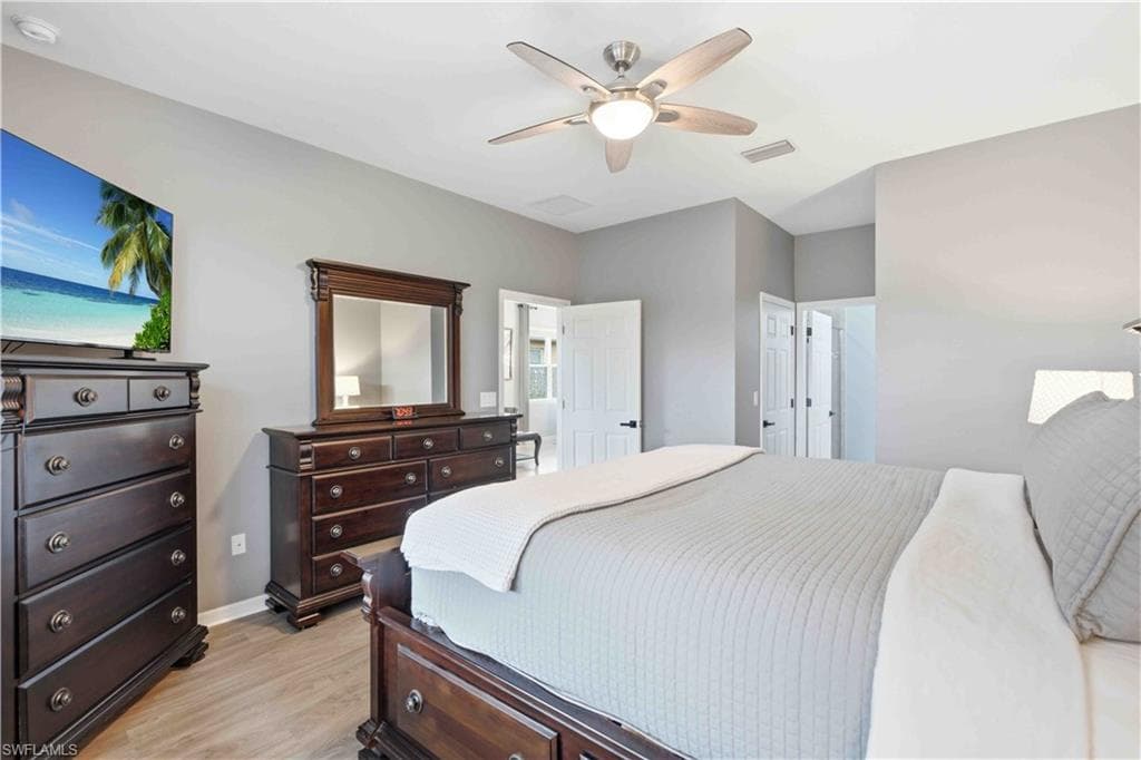 Neutral tone walls complement wood-finish flooring