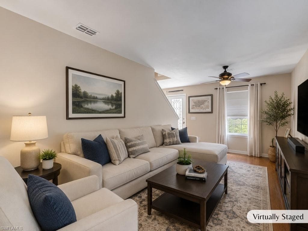 Virtually staged to show as living room.