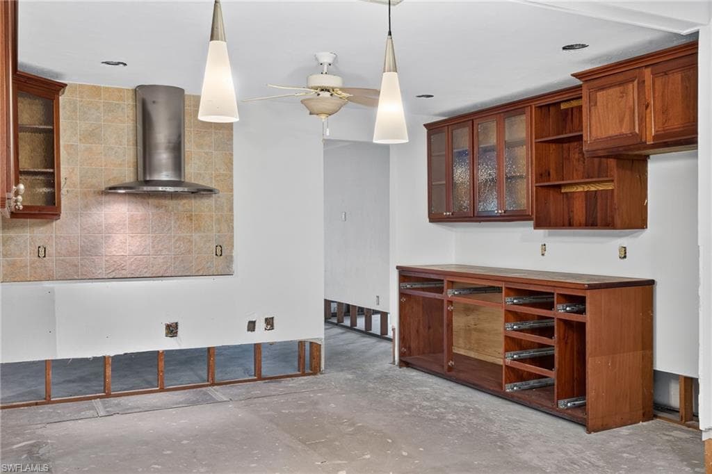 Beautiful cabinets with glass doors and range hood