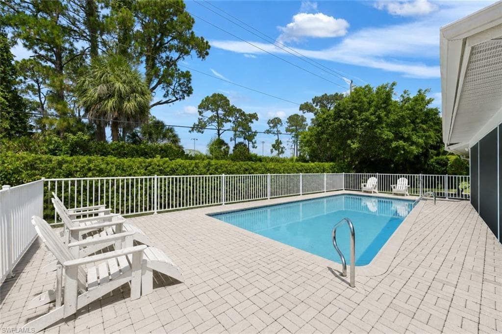 Admire sunset skies while floating in your pool as this home offers WESTERN rear exposure!