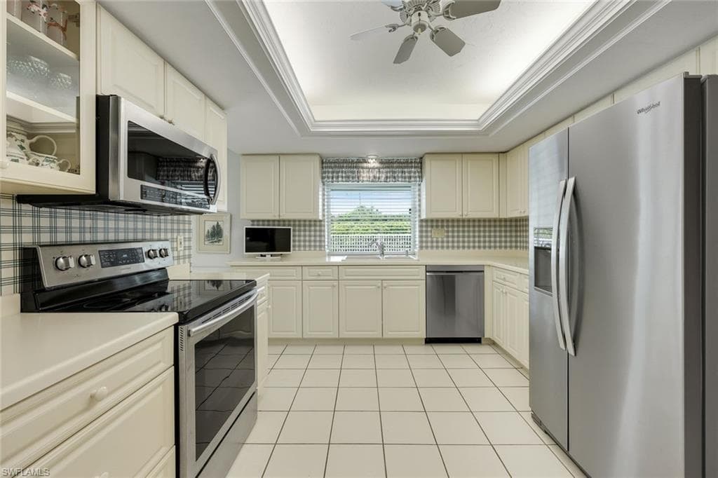 Kitchen features stainless appliances and plenty of storage!