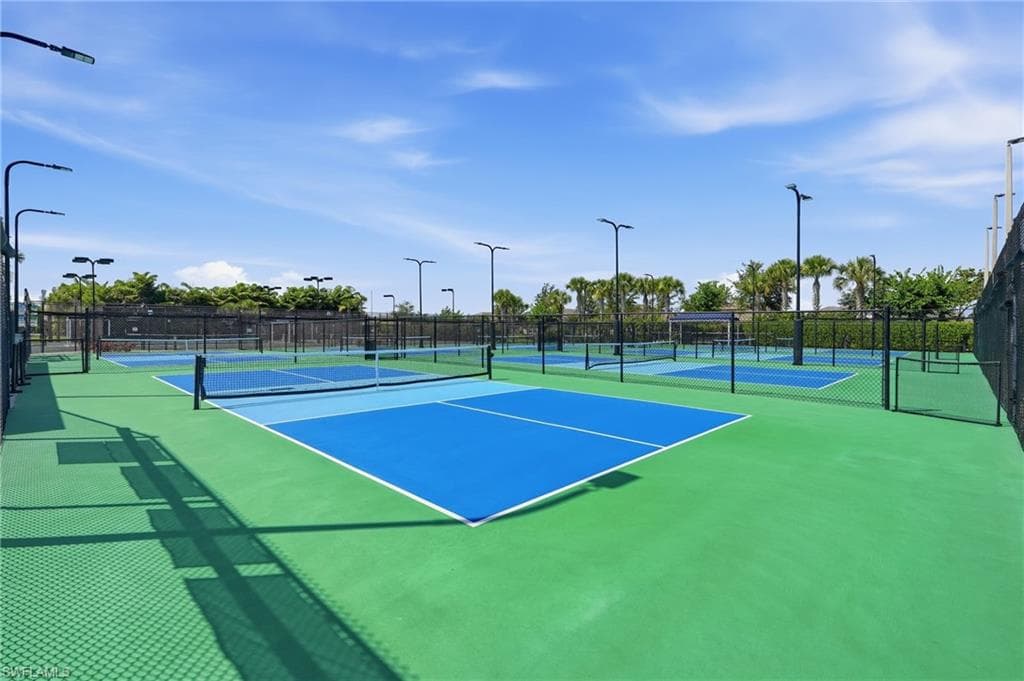 8 outdoor pickleball courts featuring blue and green surfacing