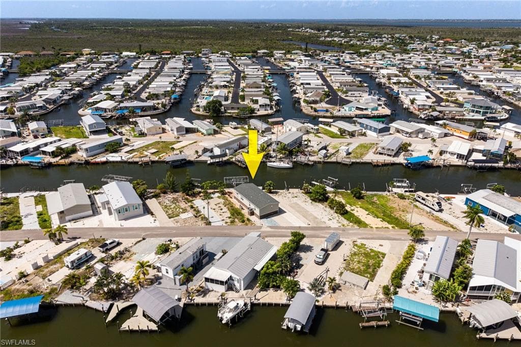Waterfront property in Cherry Estates featuring canal access and a private boat dock and lift.