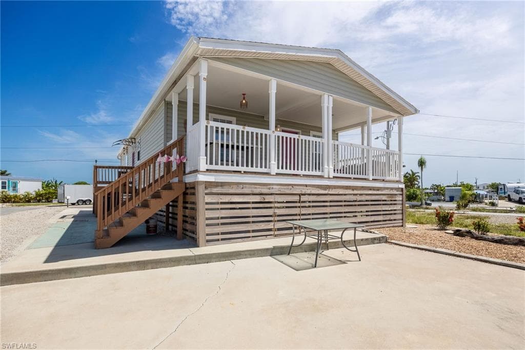 Rear exposure facing the canal with ample entertaining area.