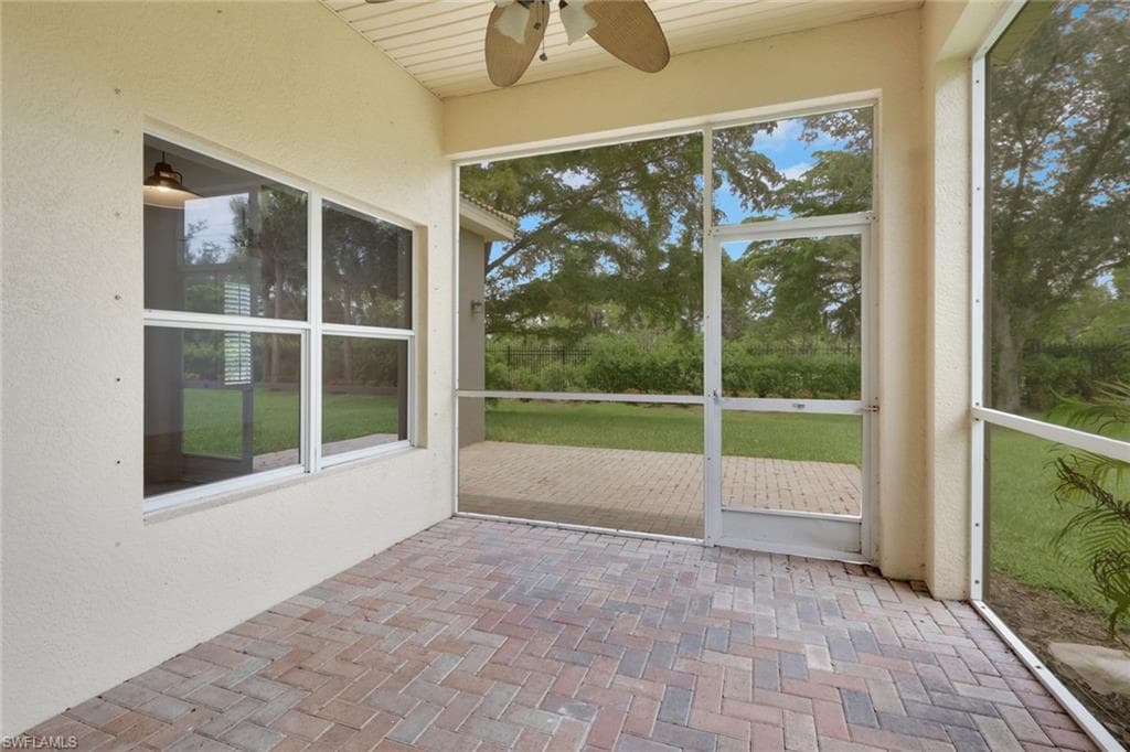 Covered and screened in patio.