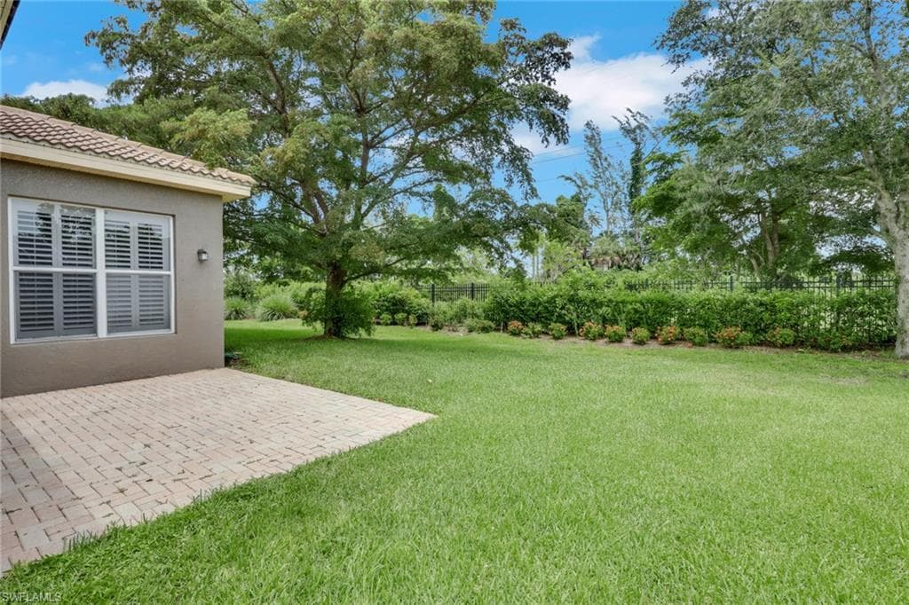 Oversize yard with privacy and mature landscaping.